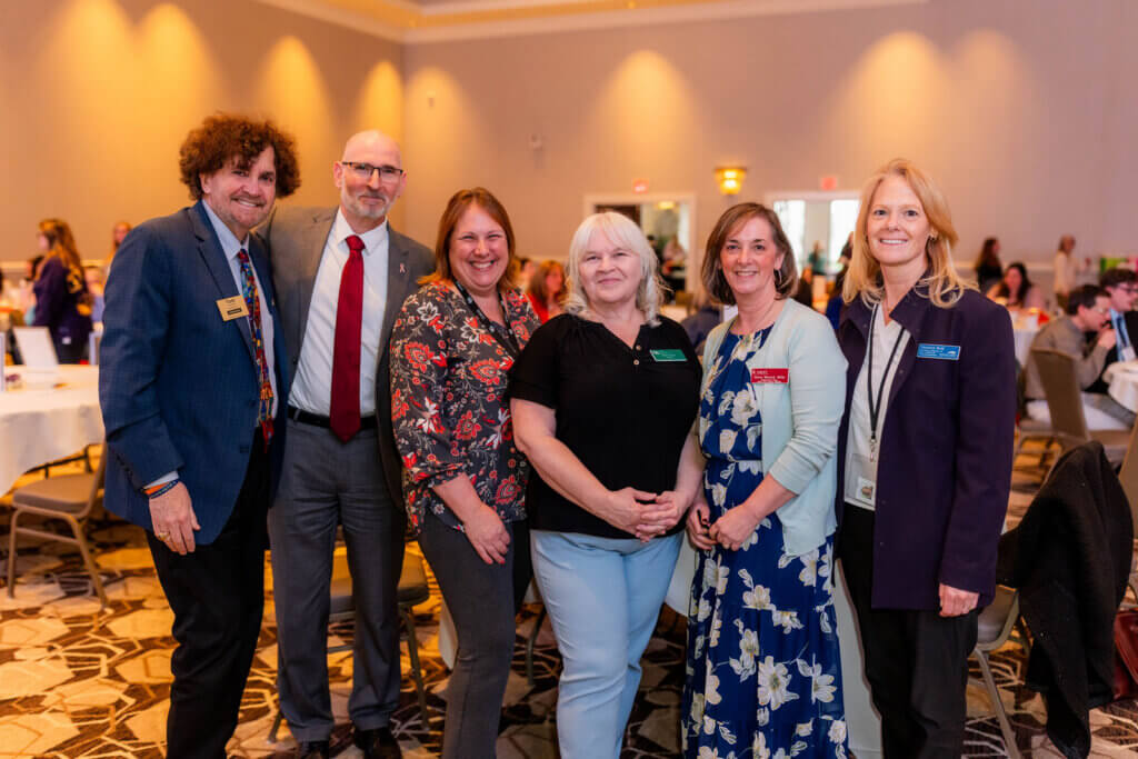 Chancellor Mark Rubenstein and four other people